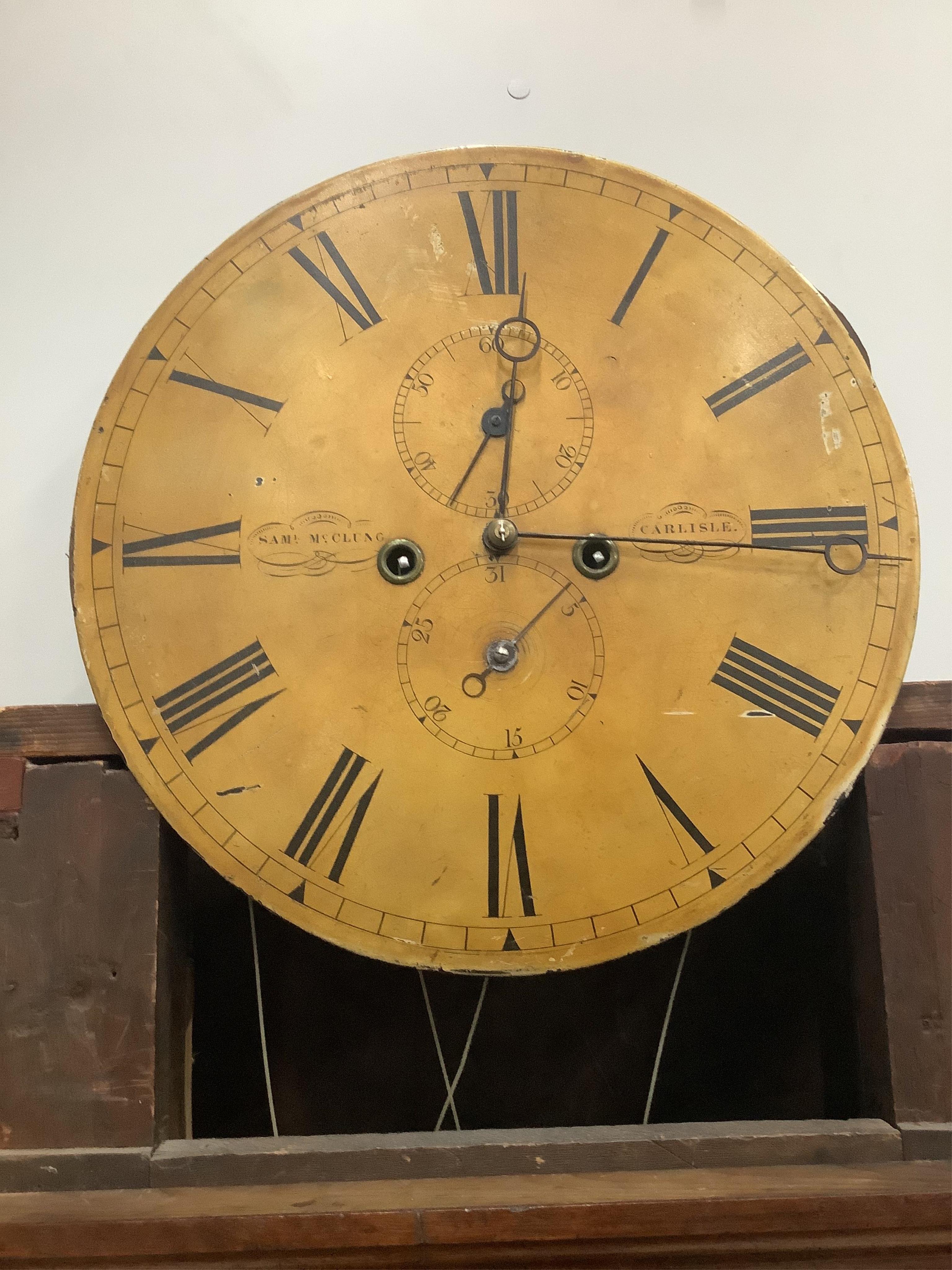 An early 19th century mahogany eight day longcase clock, the circular dial marked McClung, Carlisle, height 216cm. Condition - fair